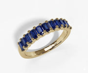 Baguette cut lab blue sapphire ring in sterling silver with sleek modern design and deep blue gemstone brilliance